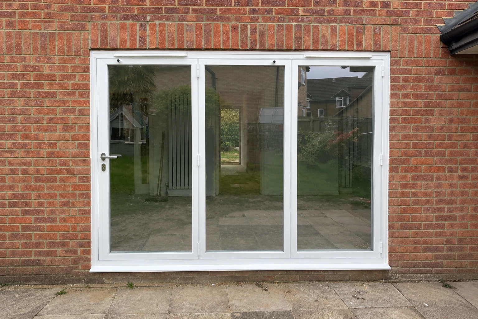 Bifold door inspiration: White · three-panel opening